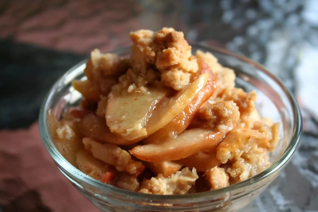 Mushed apples in a glass bowl