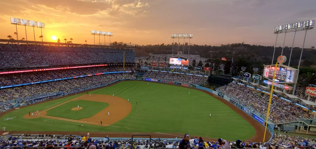 A stadium with fans photographed before night