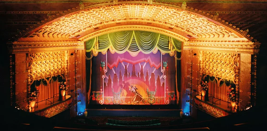 stage with a lot of lights and curtains