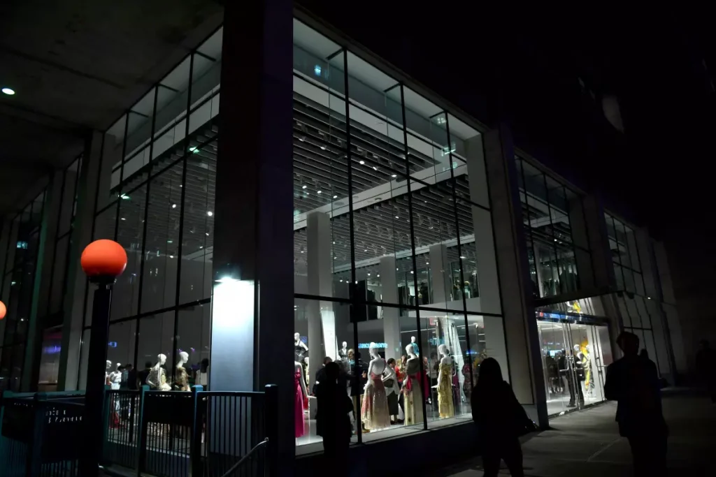 Glass building with people inside