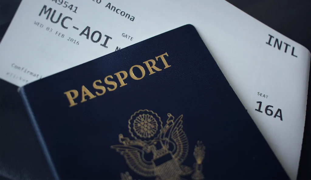 A passport with an airline ticket inside