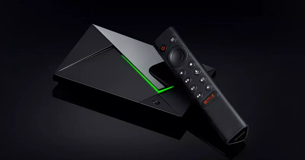 A black colored box and remote control 