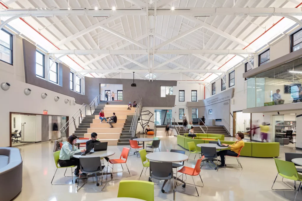 inside of a building with green furniture