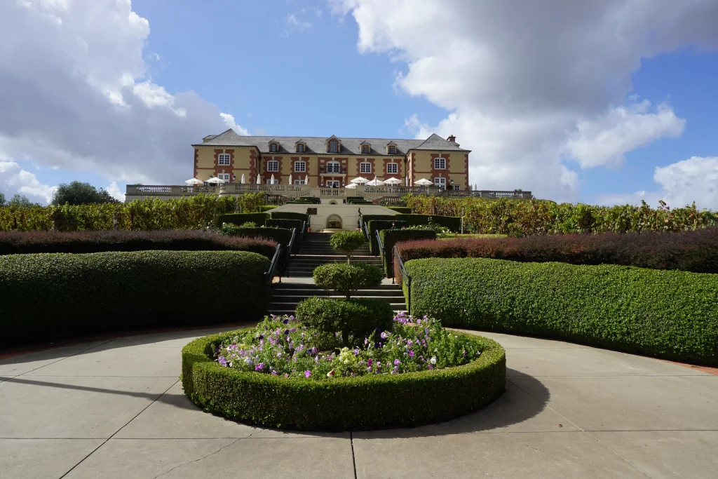 a house surrounded by a beautiful garden