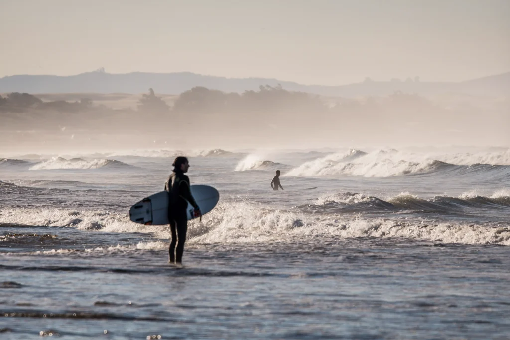 Pismo Beach surfer watching waves