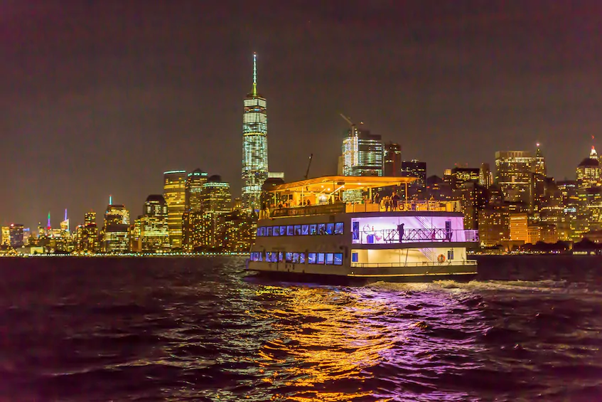 a boat on a river at night