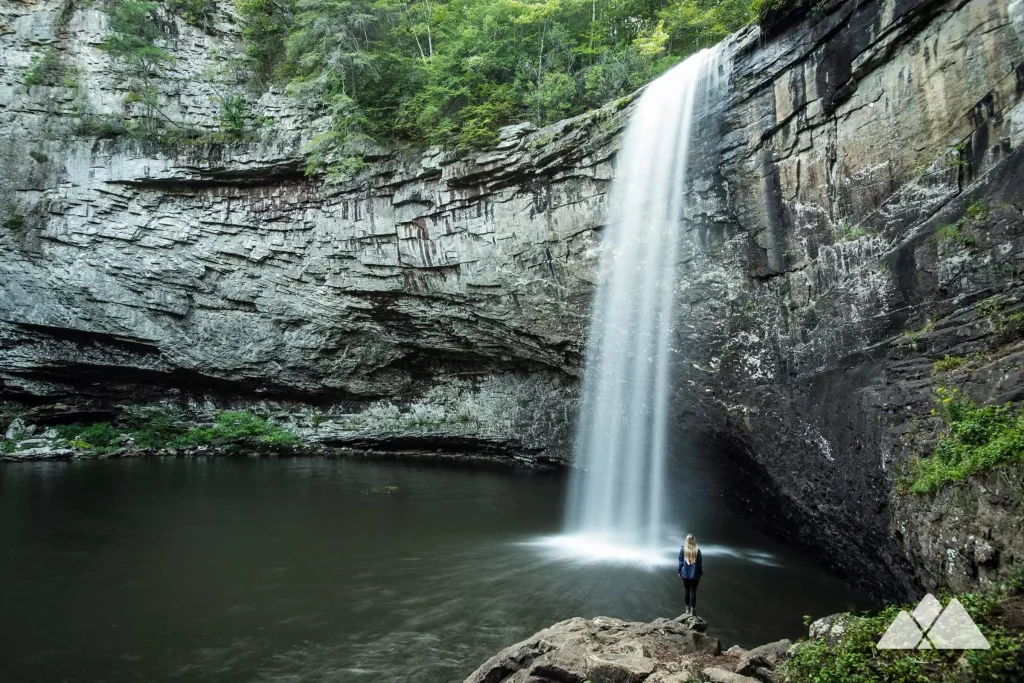 waterfall from cliffs in the middle of the forest