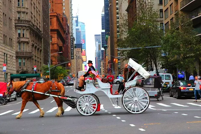 white vehicle in a city street