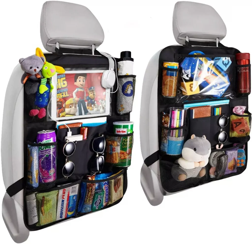 a tablet next to some chips and sweets attached to the back of a car seat in pockets