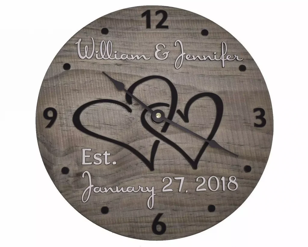 a brown themed clock with hearts on it