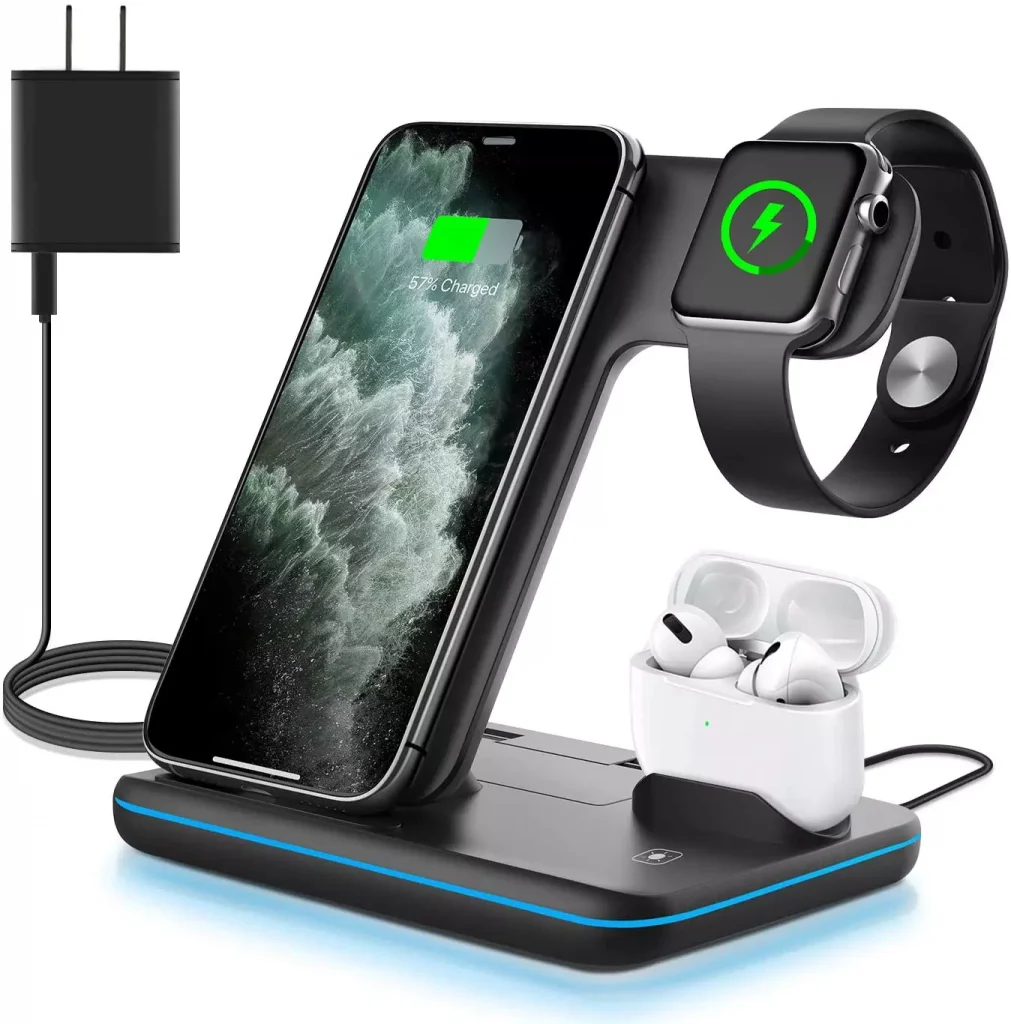 a phone watch and earphones next to each other