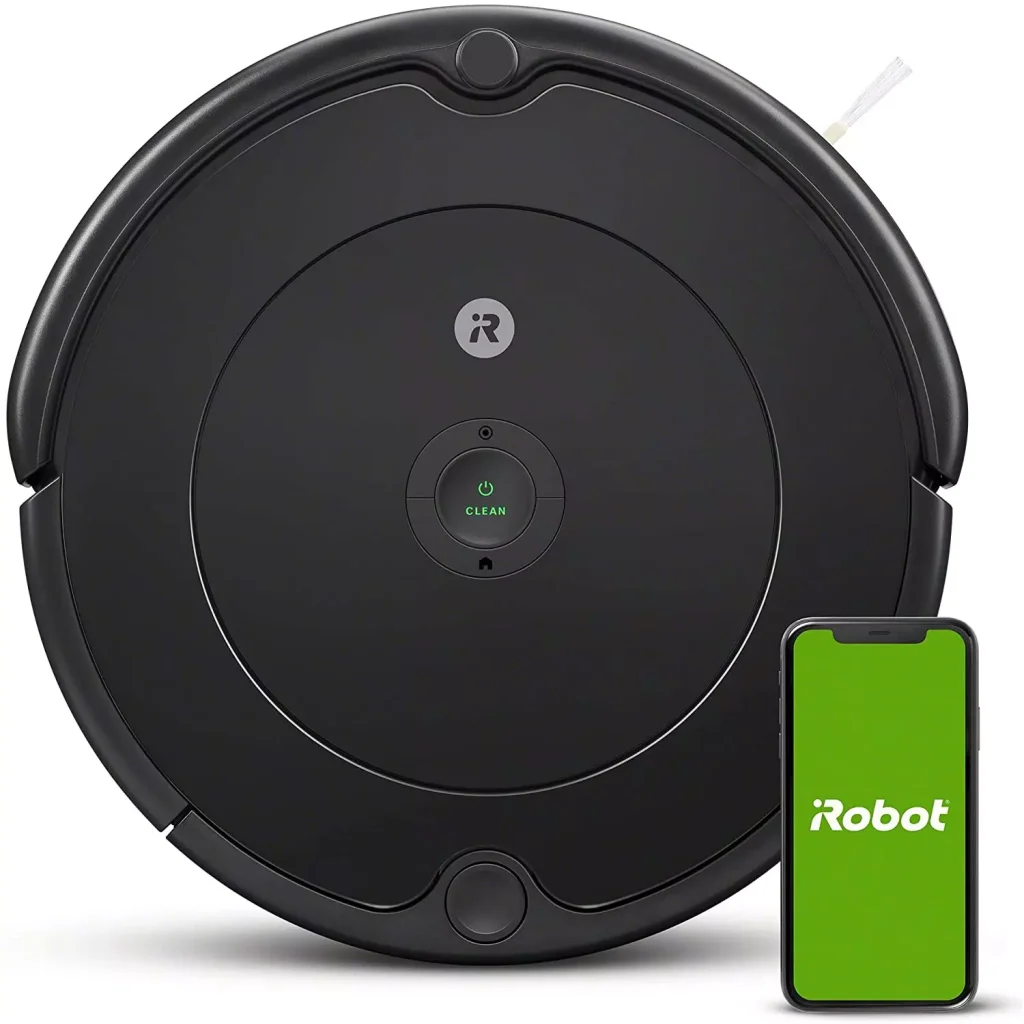 a black color circle plate next to a green smartphone