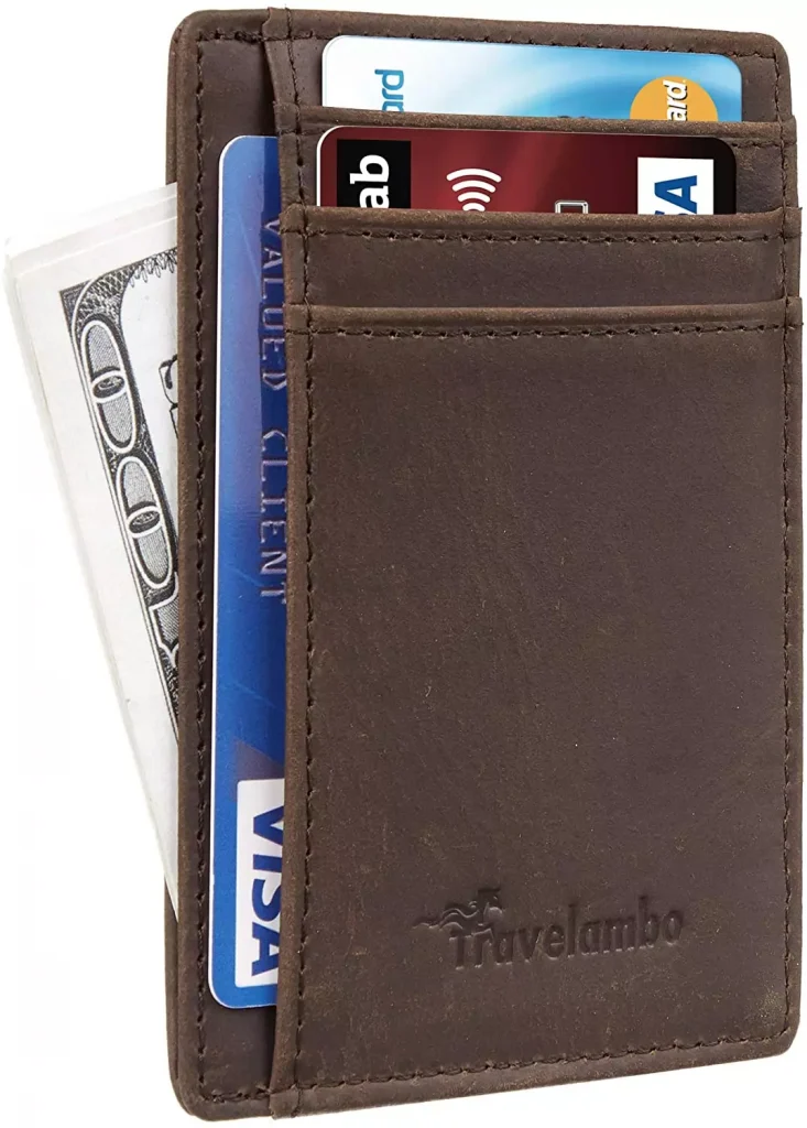 a brown color wallet with credit cards and money inside