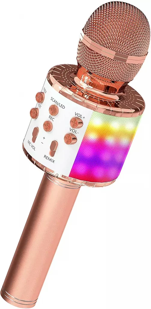 a pink color microphone with white details on it