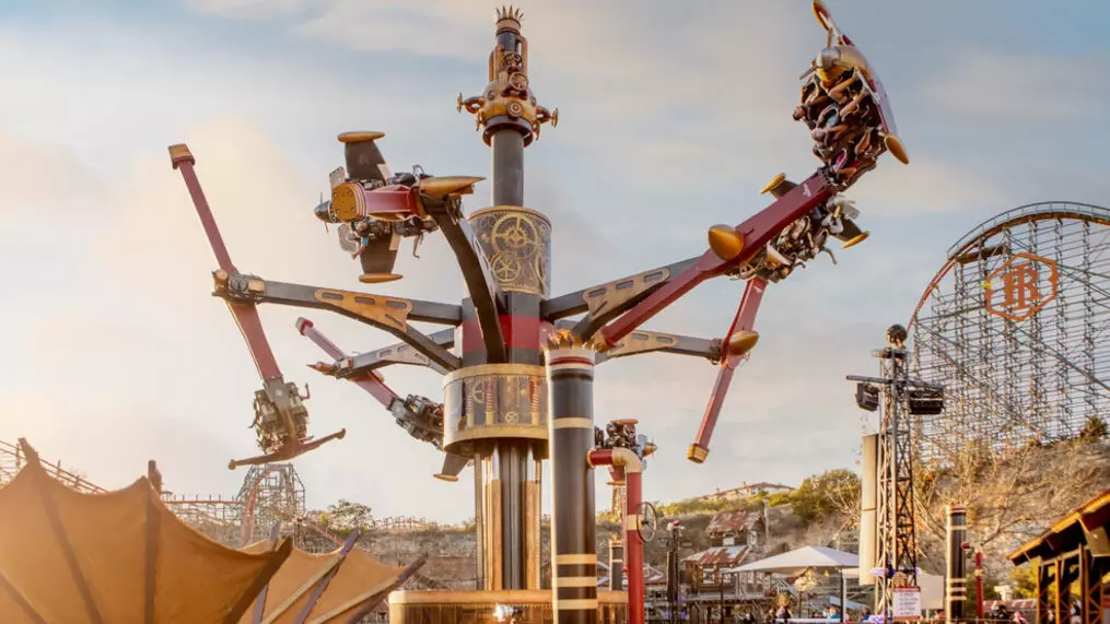 a roller coaster in an amusement park