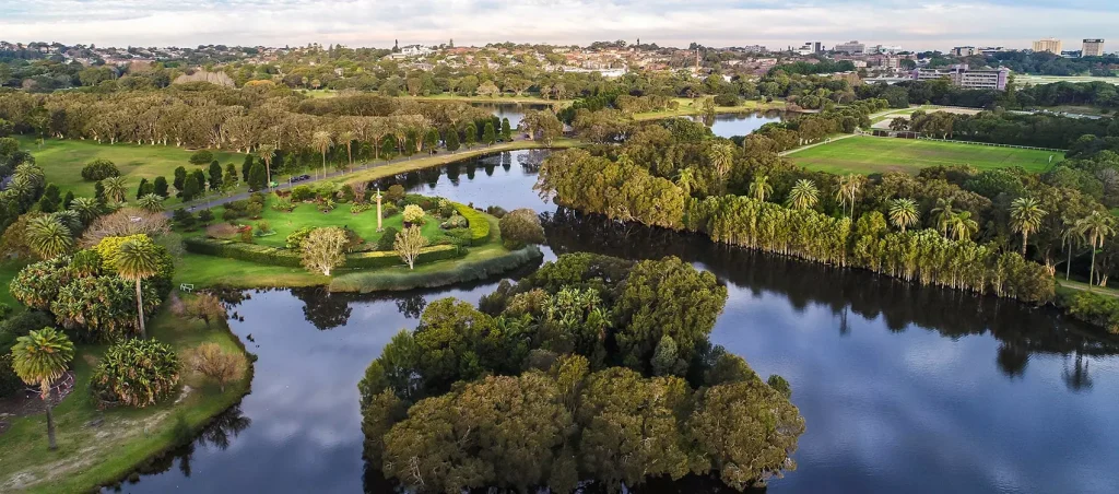 green fields with a river between them