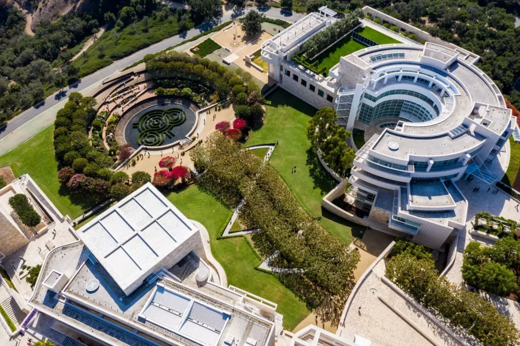 futuristic looking buildings in a green field