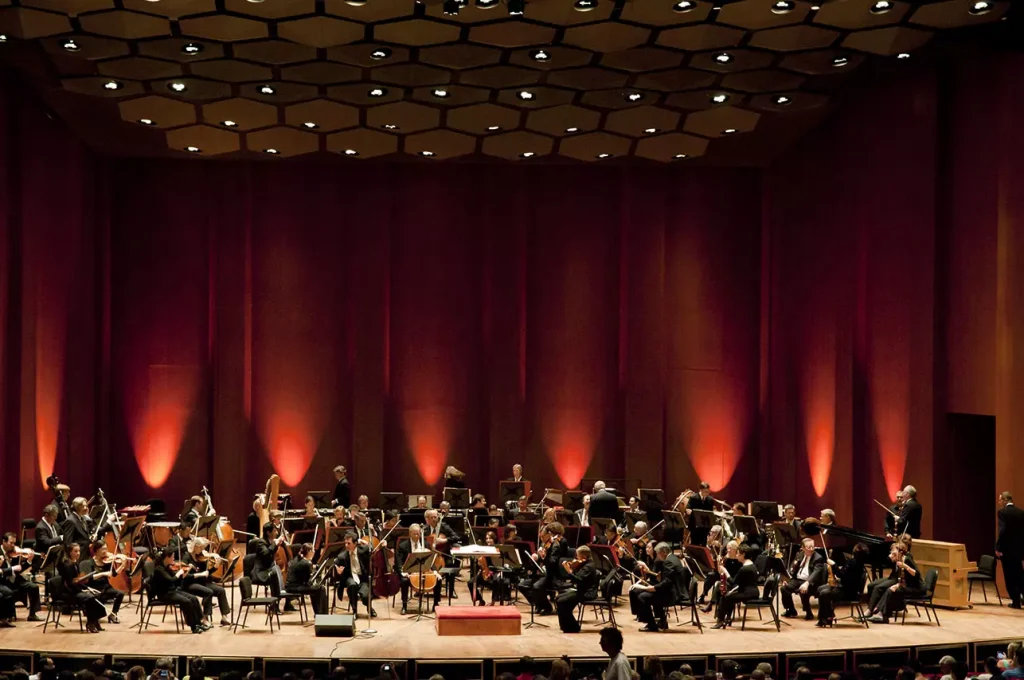 People playing musical instruments on a stage