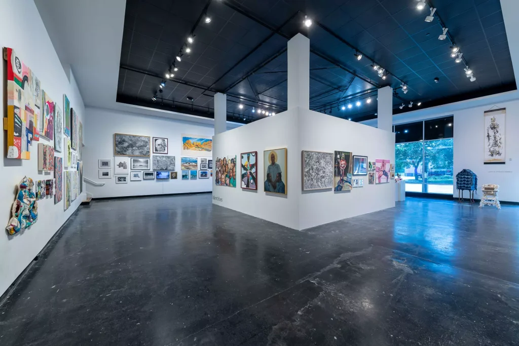 inside of an art gallery with white walls