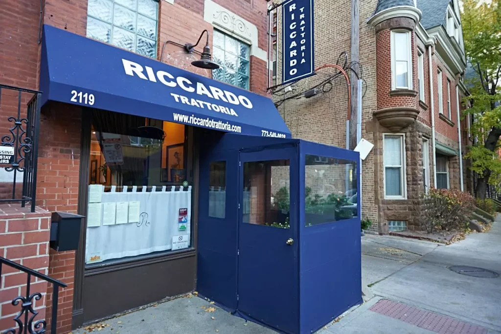 brick buildings with blue details photographed outside