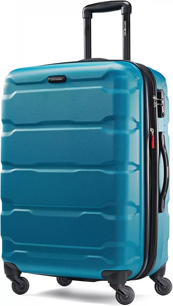 a hard shell blue color travel bag with a handle