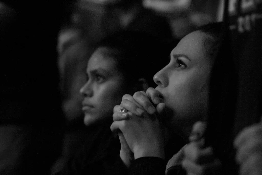 girls carefully listening to someone