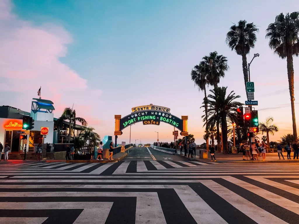 street with a lot of lights and a few palm trees