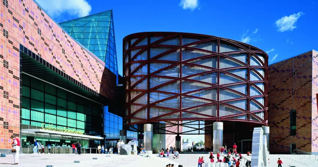 a building structure with a lot of glass windows