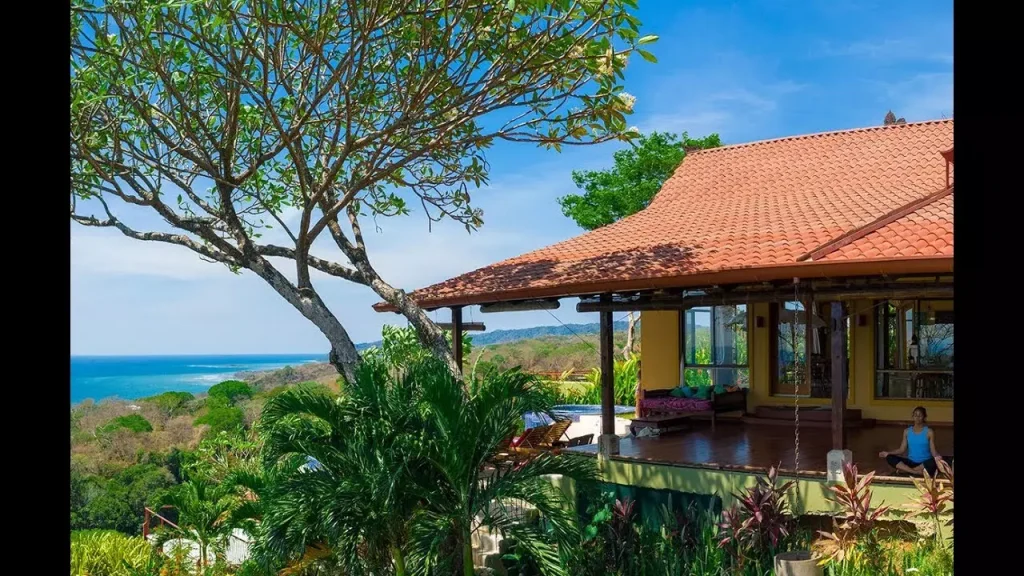 a beautiful house in the mountains surrounded by nature