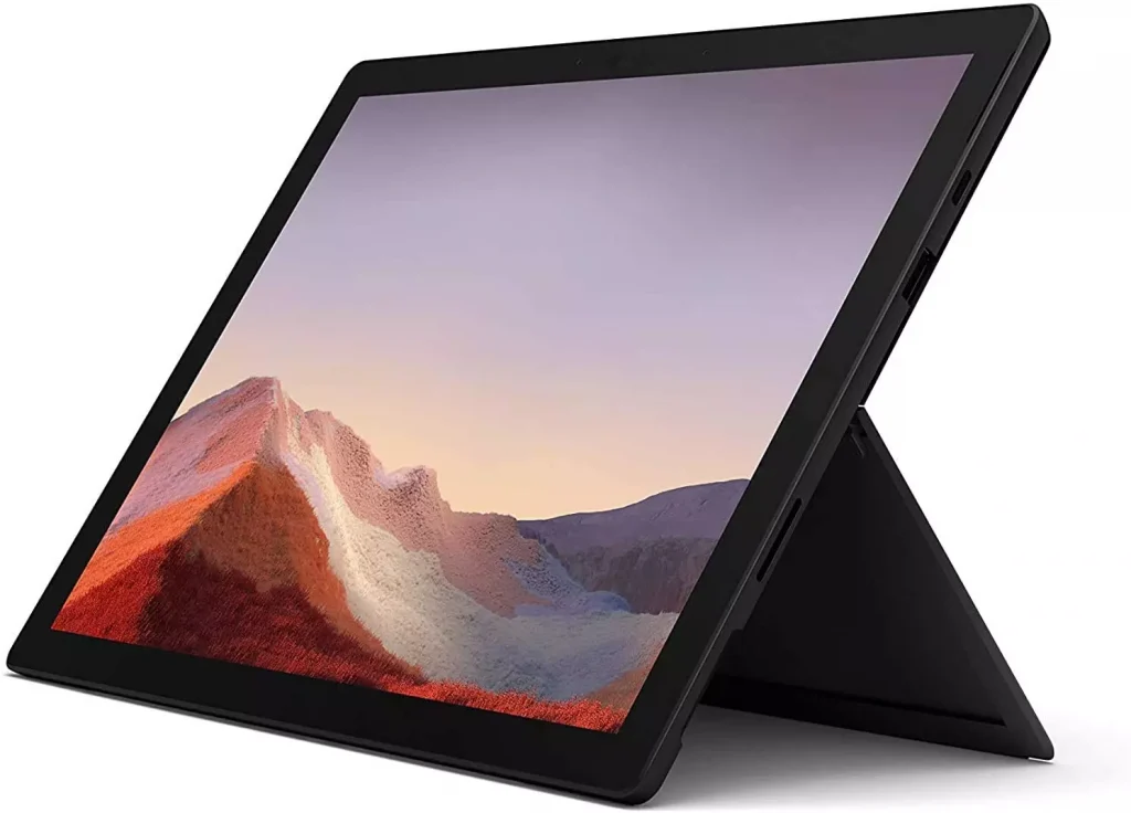 a tablet with mountains as its wallpapers