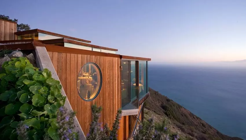 beautiful wodden house on a cliff