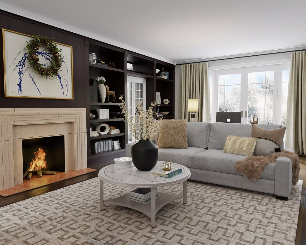 a living room with a fireplace and a grey couch with brown pillows