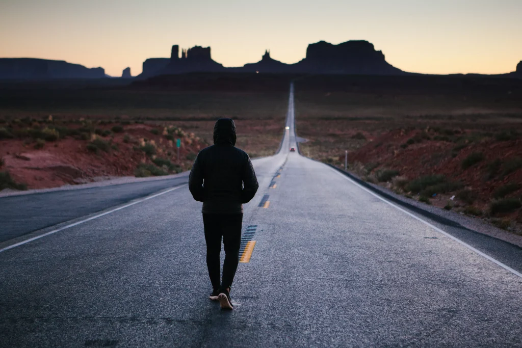 a man on a road standing