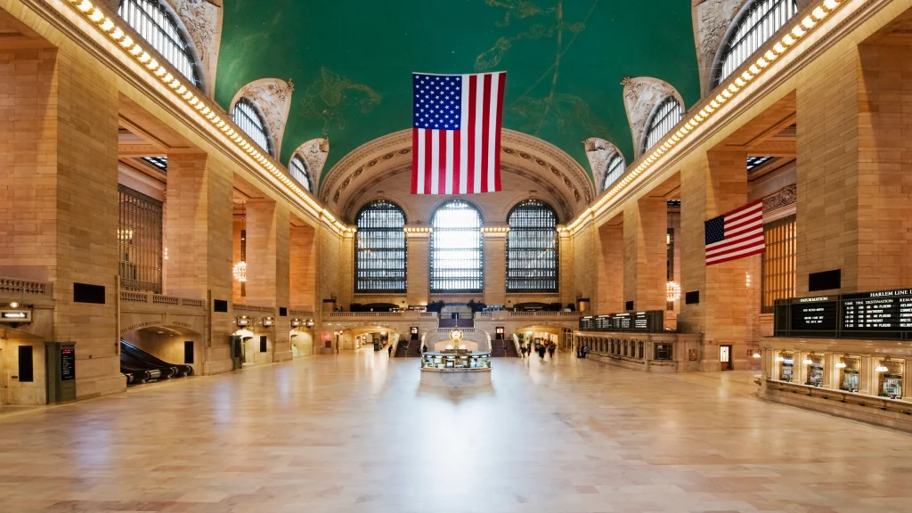 the american flag in a green and orange building