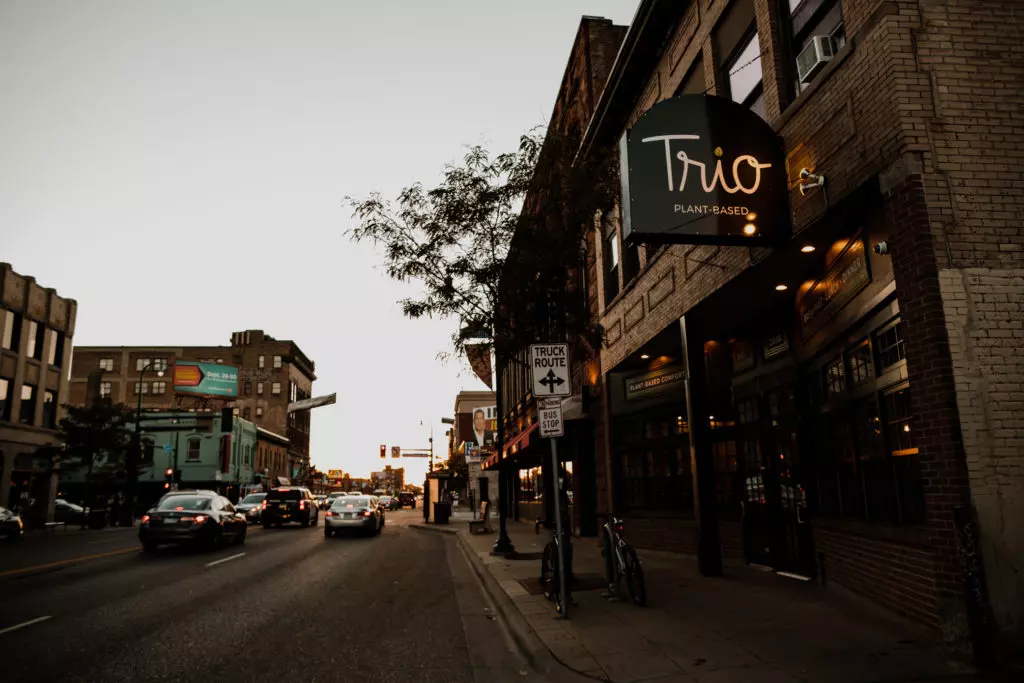 a street in a city photographed before nightfall