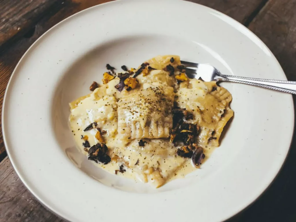 a white porculan plate full of cheese