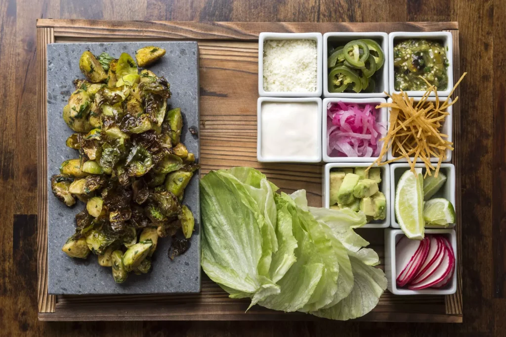 vegetables on square plates arranged next to each other