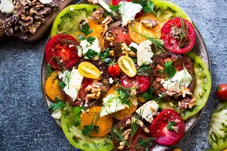 vegetables placed inside of an avocado