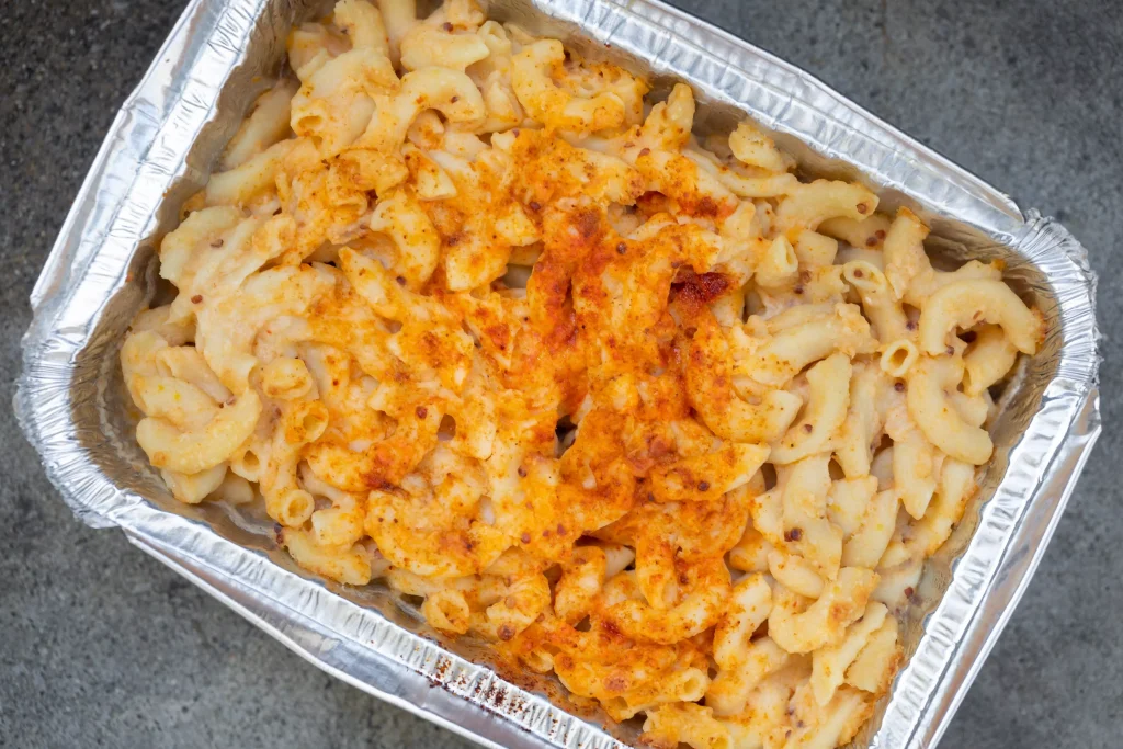 pasta with sauce in a silver bowl