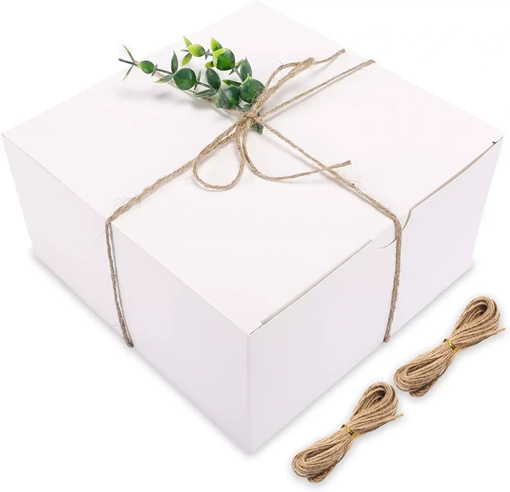 a white color gift box wrapped 