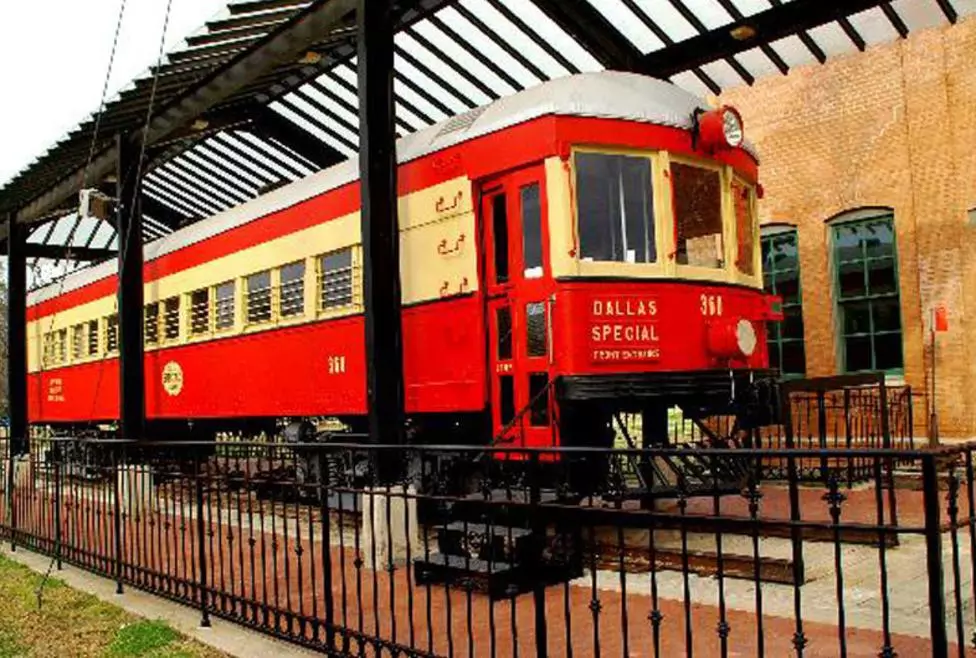 a red train in a train station