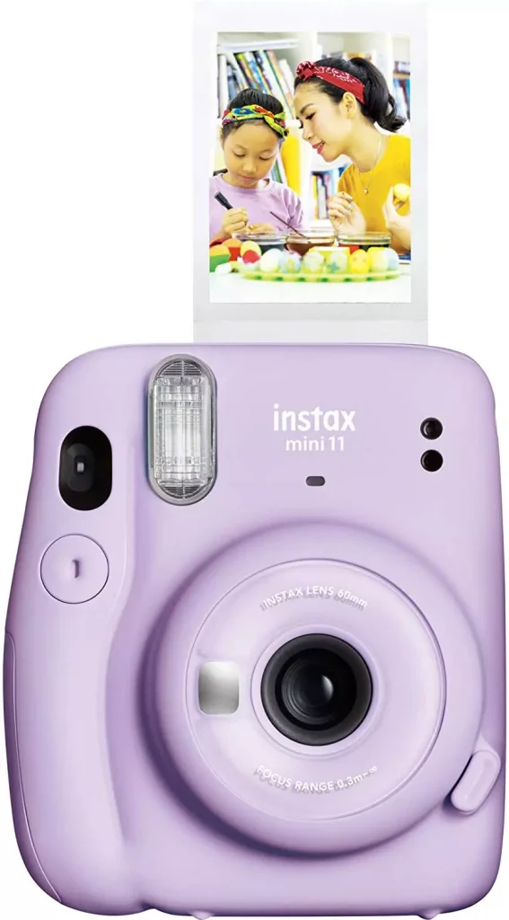 a photo camera in the color of violet