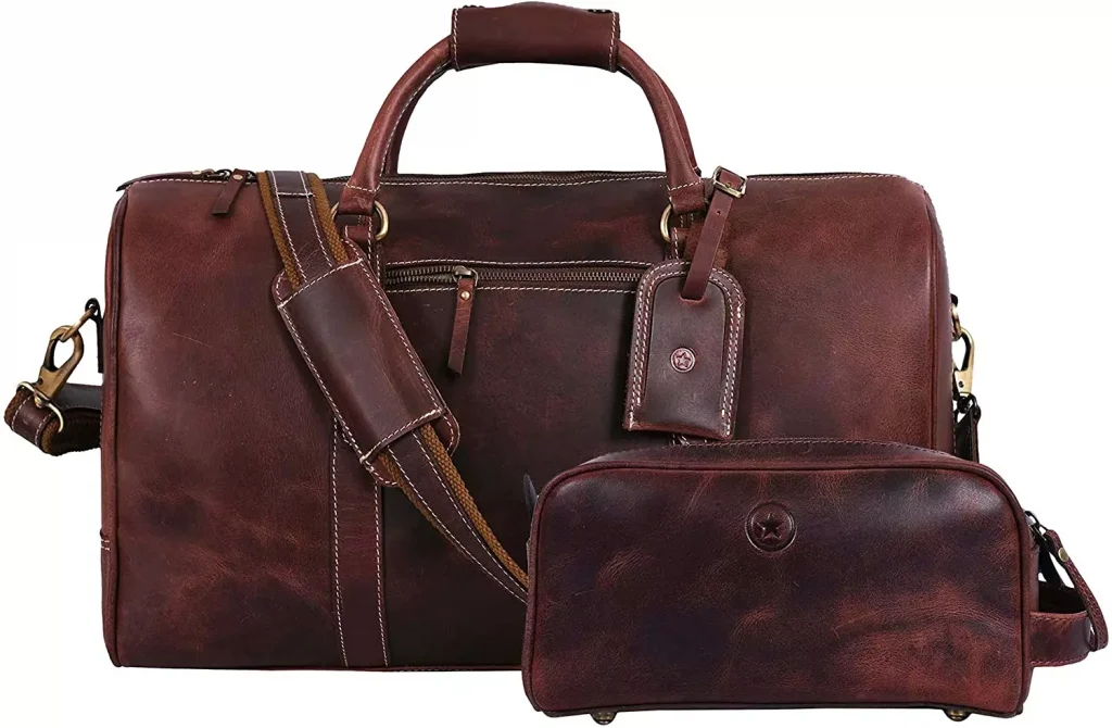 a brown leather travel bag