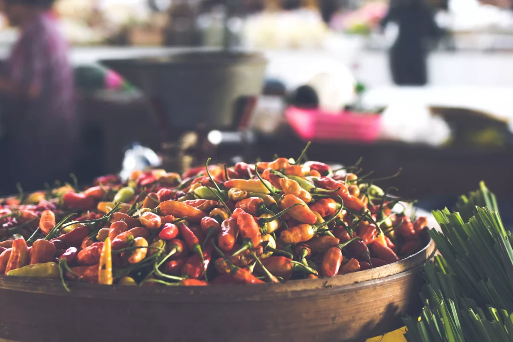 chilli peppers in a wooden bowl