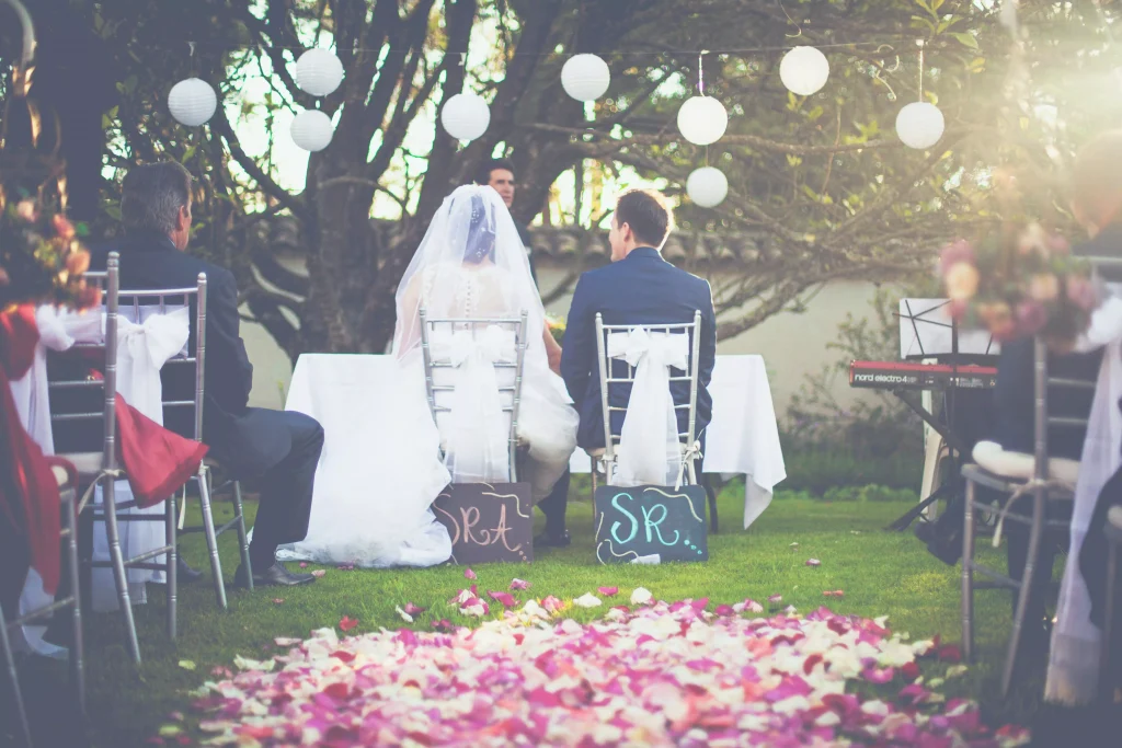 a weeding photographed from a crowd of people