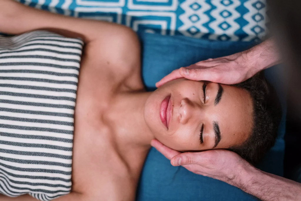 a women recieveing a face massage