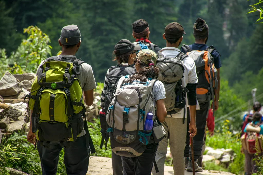 people hiking in mountains