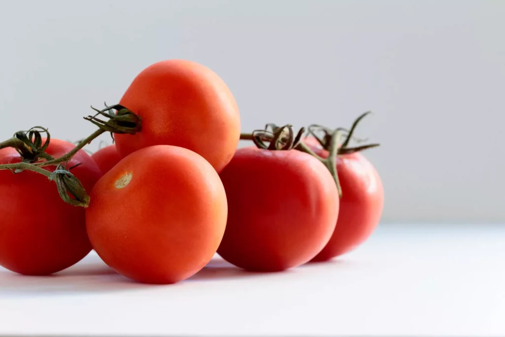 tomatoes on a white table