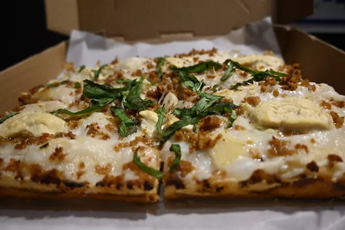 pizza dough on a brown plate