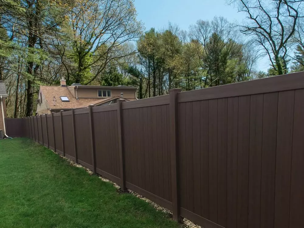 a dark brown wooden fence